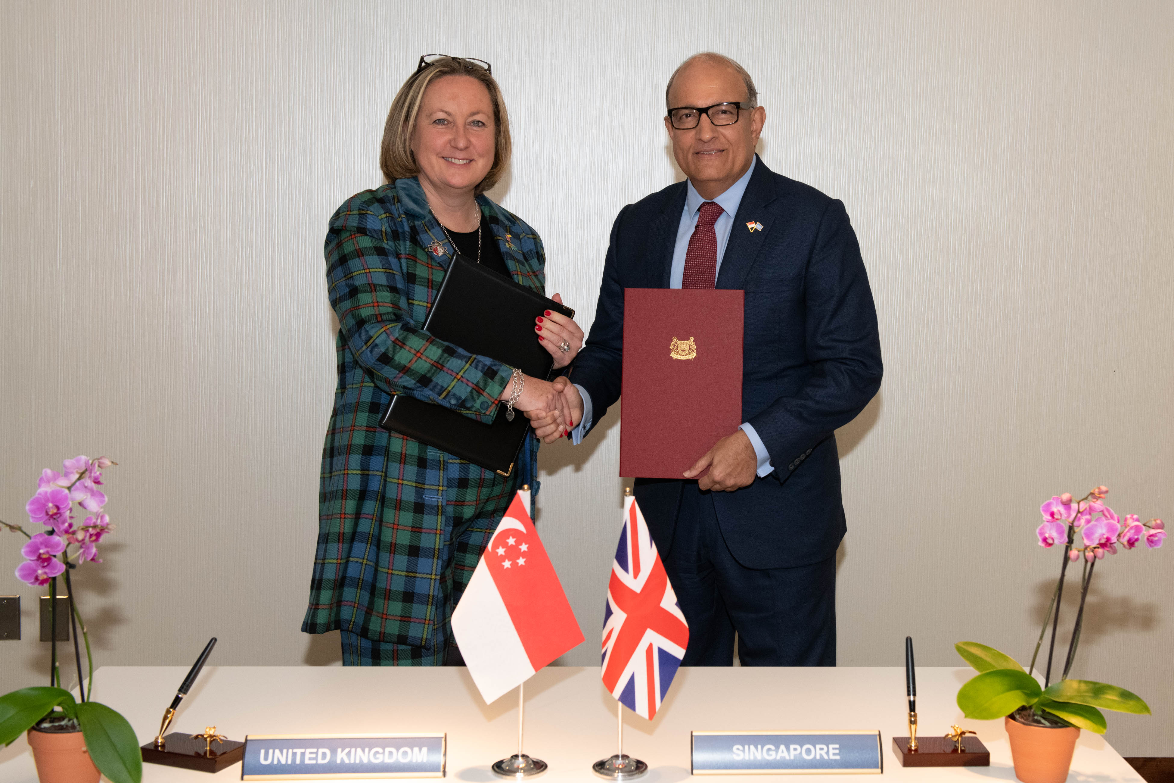 Annex C Photo of the MOU signing to update the Open Skies Agreement between Singapore and UK